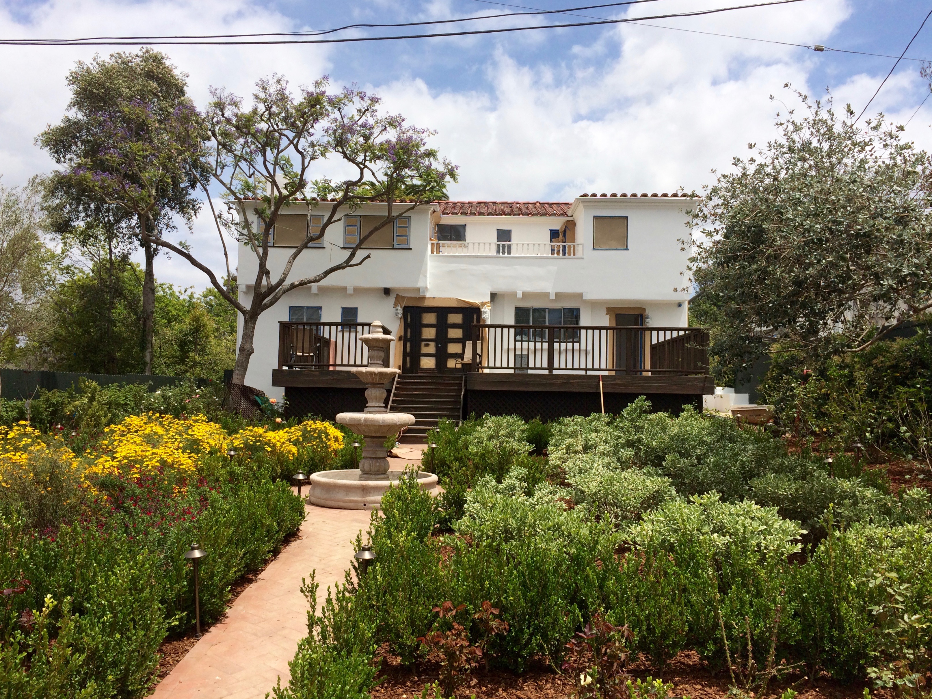 Patricia Avenue &mdash; rear garden with fountain and restored plaster facade